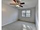 Bedroom featuring natural light from the window and neutral colored walls at 1037 Martin Rd, Stone Mountain, GA 30088