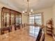 A classically furnished dining room features an extra long table set with ornate chairs and a buffet at 1037 Martin Rd, Stone Mountain, GA 30088