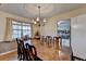 Light-filled dining room with traditional furniture, creating a cozy atmosphere for Gathering meals at 1037 Martin Rd, Stone Mountain, GA 30088