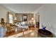 Bright living room with hardwood floors, vintage furnishings, and natural light at 1037 Martin Rd, Stone Mountain, GA 30088