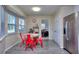 Bright kitchen with eat-in area featuring stainless steel fridge and view of the living area at 2493 Cherie Glen Trl, Snellville, GA 30039