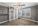 Bedroom showcasing ample closet space, neutral walls, and a well-lit window at 260 Mansell Cir, Roswell, GA 30075