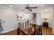 Traditional dining room with hardwood floors and a view into the kitchen at 260 Mansell Cir, Roswell, GA 30075
