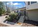 Inviting entryway to a home with manicured landscaping and a charming, welcoming entranceway at 260 Mansell Cir, Roswell, GA 30075