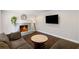 Living room with fireplace, and hardwood floors at 260 Mansell Cir, Roswell, GA 30075