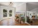 Dining area with lots of natural light with a view to deck and living area at 260 Mansell Cir, Roswell, GA 30075