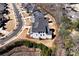 Aerial view of the back of the home, showcasing the yard, fence line, and surrounding neighborhood at 320 Dodd Ln, Alpharetta, GA 30005