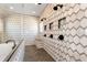 Modern bathroom featuring hexagon tile walls, dual shower heads, built-in bench and niches at 320 Dodd Ln, Alpharetta, GA 30005
