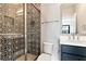 Bathroom features a modern vanity and a shower with decorative tile at 320 Dodd Ln, Alpharetta, GA 30005