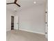 Large bedroom with plush carpet, ceiling fan, and white trim throughout at 320 Dodd Ln, Alpharetta, GA 30005