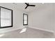Bright bedroom with carpeted floor, ceiling fan and windows at 320 Dodd Ln, Alpharetta, GA 30005