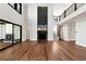 Spacious living room with tall ceilings, fireplace and hardwood floors at 320 Dodd Ln, Alpharetta, GA 30005