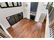 Spacious living room featuring hardwood floors, large windows, and a modern fireplace at 320 Dodd Ln, Alpharetta, GA 30005