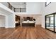 Open floor plan with view from living room to kitchen and dining area at 320 Dodd Ln, Alpharetta, GA 30005