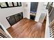 Living room view from above with hardwood floors, high ceilings, and access to the outdoor deck at 320 Dodd Ln, Alpharetta, GA 30005