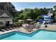 Community pool featuring pool-side seating, splash area, and slide at 320 Dodd Ln, Alpharetta, GA 30005