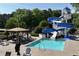 A close up view of a community pool slide and gazebo area at 320 Dodd Ln, Alpharetta, GA 30005