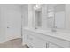 Bathroom featuring a double sink vanity with quartz countertops and modern fixtures, and tile flooring at , Mcdonough, GA 30253