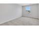 Well-lit bedroom with plush carpet, a window with a view, and neutral-colored walls at , Mcdonough, GA 30253