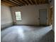 Partially finished basement features a window, a door, concrete flooring, and exposed ductwork at 3836 Misty Lake, Ellenwood, GA 30294