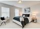 Bedroom with lots of natural light, neutral decor and modern furniture at 4814 Floydwood Ln, Mableton, GA 30126