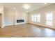 Spacious living room with fireplace and access to the backyard at 4814 Floydwood Ln, Mableton, GA 30126
