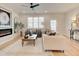 Inviting living room boasts hardwood floors, a cozy fireplace, and plenty of natural light at 4814 Floydwood Ln, Mableton, GA 30126