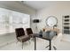 Home office with modern decor, lots of natural light, and comfortable seating at 4814 Floydwood Ln, Mableton, GA 30126
