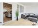 Relaxing covered patio with a wicker seating area, perfect for outdoor enjoyment at 4814 Floydwood Ln, Mableton, GA 30126