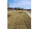 Landscaped street in a new construction neighborhood with newly laid sod at 4814 Floydwood Ln, Mableton, GA 30126