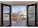 Expansive balcony view featuring an outdoor seating area and city skyline at 560 John Wesley Dobbs Ave, Atlanta, GA 30312