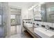 Bright bathroom with double sinks, tiled shower, and modern finishes at 560 John Wesley Dobbs Ave, Atlanta, GA 30312