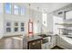 Open-concept kitchen with large windows, high ceilings, concrete countertops and farm style sink at 560 John Wesley Dobbs Ave, Atlanta, GA 30312