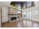 Inviting living room with modern fireplace, wood accent wall, and stylish lighting at 560 John Wesley Dobbs Ave, Atlanta, GA 30312