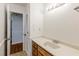 Bathroom with vanity sink, cabinet storage, and a light fixture above the sink at 3435 Macland Rd, Powder Springs, GA 30127
