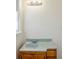 Bathroom with wooden vanity and solid surface countertop with a single sink at 3435 Macland Rd, Powder Springs, GA 30127
