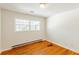 Bedroom featuring hardwood floors and natural light at 3435 Macland Rd, Powder Springs, GA 30127