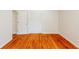 Bedroom featuring beautiful hardwood floors, neutral walls, an ample closet, and natural light at 3435 Macland Rd, Powder Springs, GA 30127