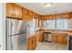 Well-equipped kitchen with ample cabinetry and stainless steel appliances at 3435 Macland Rd, Powder Springs, GA 30127