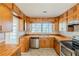Spacious kitchen featuring butcher block countertops and stainless steel appliances at 3435 Macland Rd, Powder Springs, GA 30127