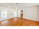 Bright living room featuring gleaming wood floors, a fresh paint palette, and an abundance of natural light at 3435 Macland Rd, Powder Springs, GA 30127