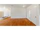 Open room with hardwood floors and bright windows offering natural light at 3435 Macland Rd, Powder Springs, GA 30127