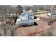 Aerial view of the house, backyard, and additional living space at 510 Forest St, Buford, GA 30518