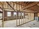 Unfinished basement featuring exposed wood framing and natural light at 510 Forest St, Buford, GA 30518