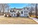 Charming two-story home with white siding, a well-kept lawn, and a welcoming entrance at 510 Forest St, Buford, GA 30518