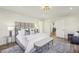 Comfortable bedroom with carpet, natural light, and stylish furnishings at 510 Forest St, Buford, GA 30518