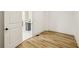Empty room with light wood flooring and baseboard at 510 Forest St, Buford, GA 30518