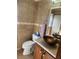 Bathroom features vanity with a vessel sink and decorative mirror at 956 S Deshon Rd, Lithonia, GA 30058