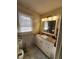 Bright bathroom with marble countertops, cabinets, and stainless steel faucet at 956 S Deshon Rd, Lithonia, GA 30058