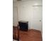 Upstairs hallway with hardwood floors and access to multiple rooms at 956 S Deshon Rd, Lithonia, GA 30058